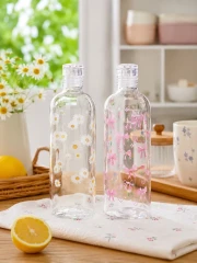 بطری شیشه‌ای درب‌دار طرح پاپیون صورتی