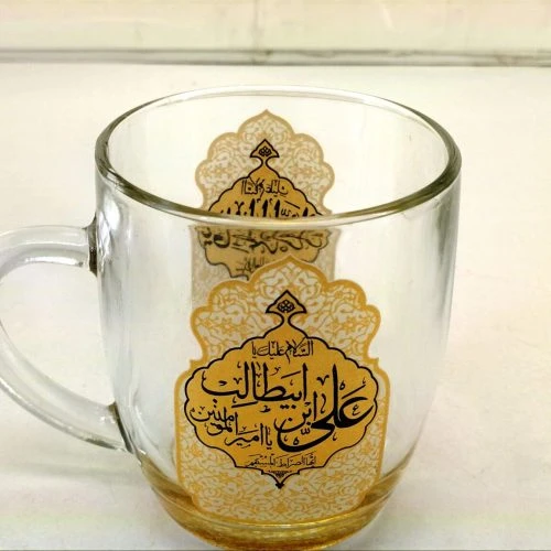 103444-لیوان شیشه ای دسته دار شفاف طلایی یا امیرالمومنین علی بن ابیطالب ع و یا فاطمه الزهرا س