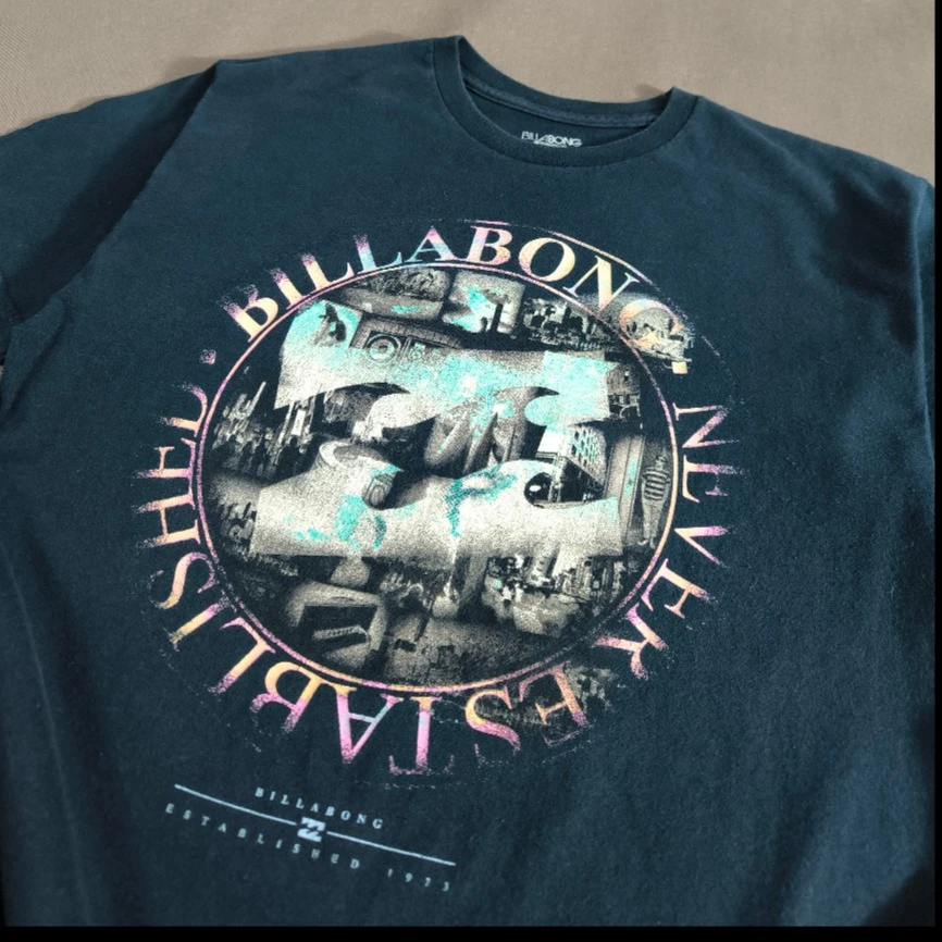 SIZE S-M تیشرت اورجینال  برند معتبر BILLABONG مدل NEVER ESTABLISHED