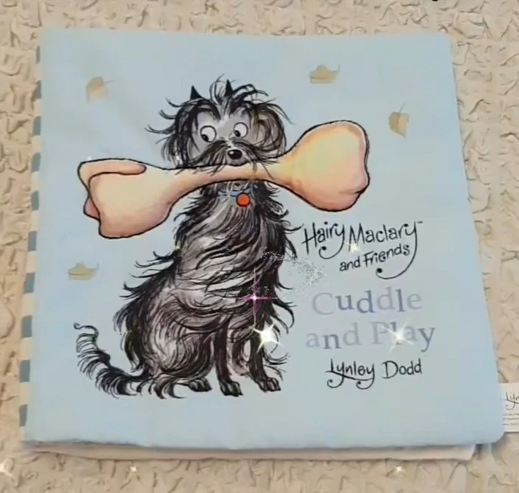 Story cuddly and play cloth book