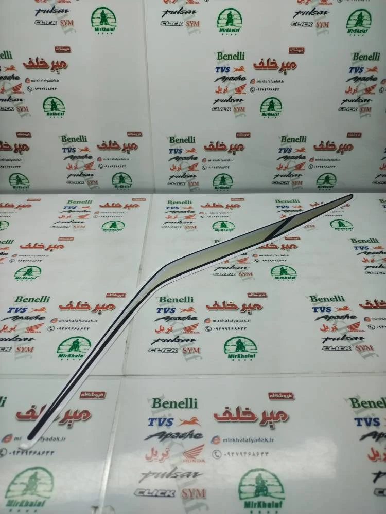 ارم (برچسب) قاب (فلاپ) دمی زیر زین موتور sym گالکسی na بژ اصلی (راست)