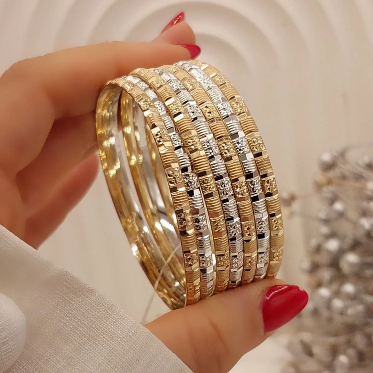 النگو دو رنگ طرح طلای زنانه،جنس طلا روس،پک ۷ تایی،۵ سال ماندگاری💍