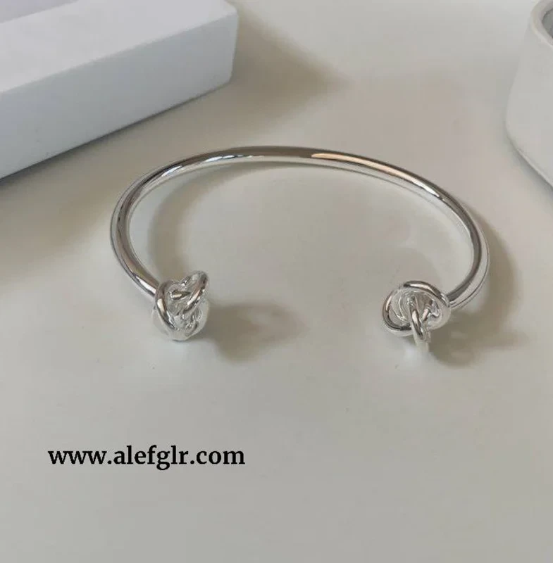 بنگل ( تکپوش) دفرمه دو گره ای ابکاری نقره