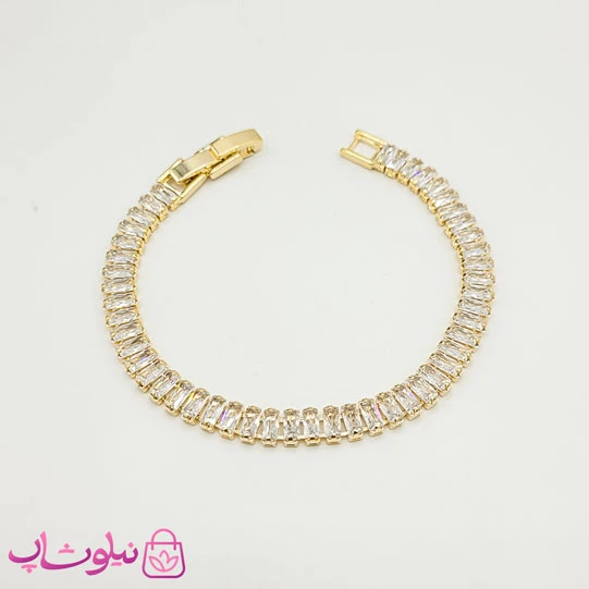 دستبند زنانه تنیسی مدل طلایی نگین باگتی سفید کد 350