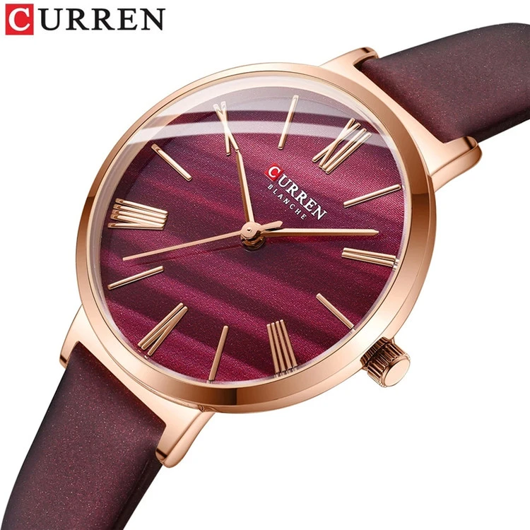 ساعت استیل زنانه بند چرمی یونانی کارن 9076L (کورن CURREN) بنفش
