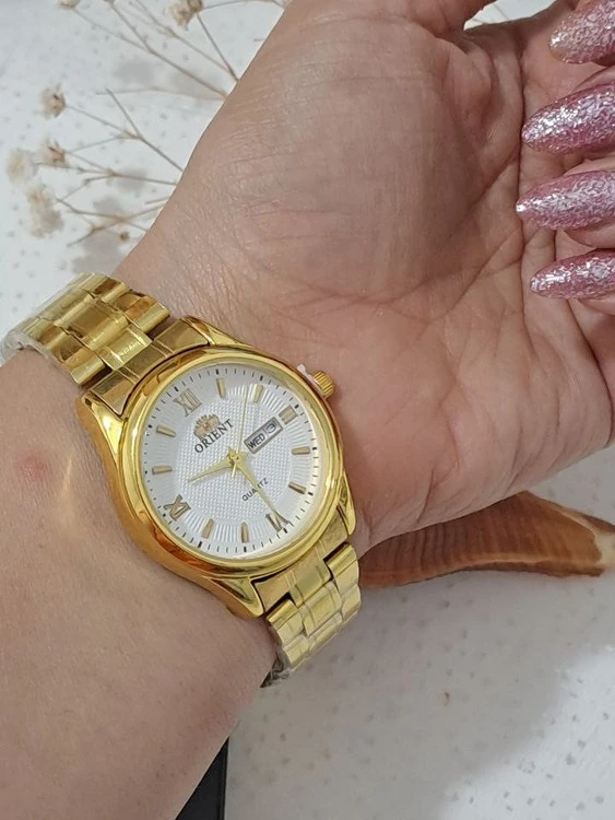 ساعت مچی زنانه اورینت تمام استیل طلایی کد S1O1