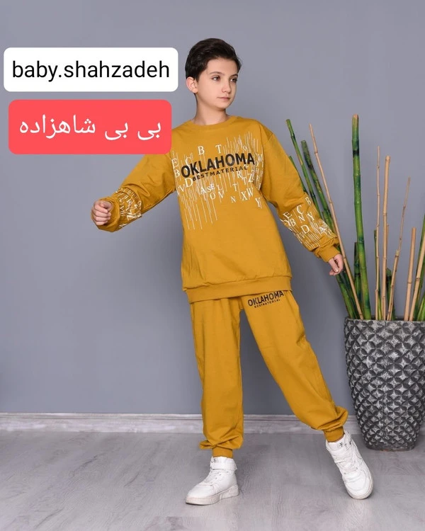 ست بلوز شلوار اسپرت بچگانه برند گل شید مدل اُکلاهُما رنگ خردلی سایز 65