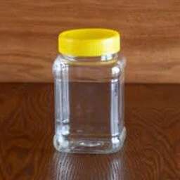 ظرف پلاستیک 700 سی سی ( یک‌کیلو عسل ) با درب بسته 50 عددی