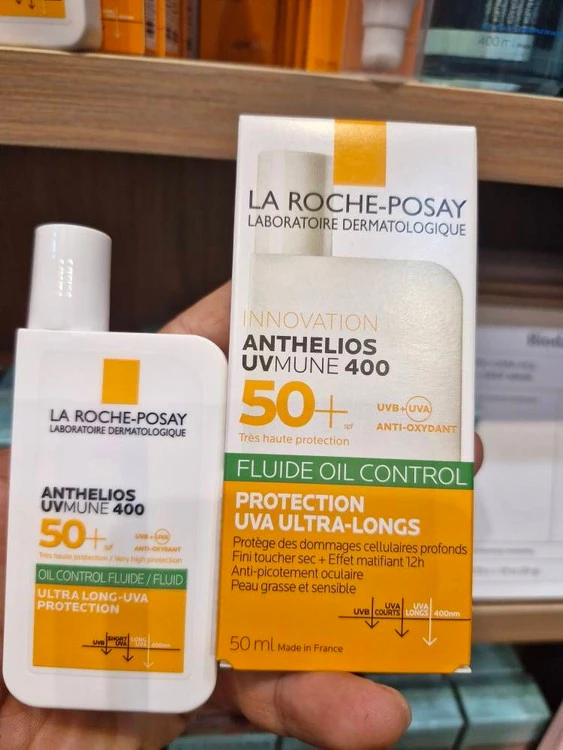 فلوئید ضد آفتاب لاروش پوزای مدل FLUIDE INVISIBLE حجم 50 میل LA ROCHE POSAY ANTHELIOS UVMUNE 400 FLUIDE INVISIBLE SPF50
