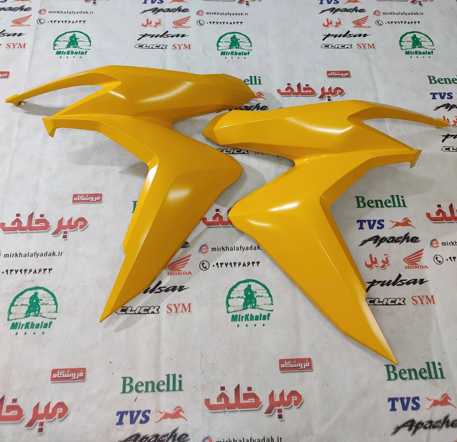 قاب (کاور فلاپ) بغل بلوری چراغ جلو موتور طرح کلیک (زرد انبه ای) خارجی (سمت چپ)
