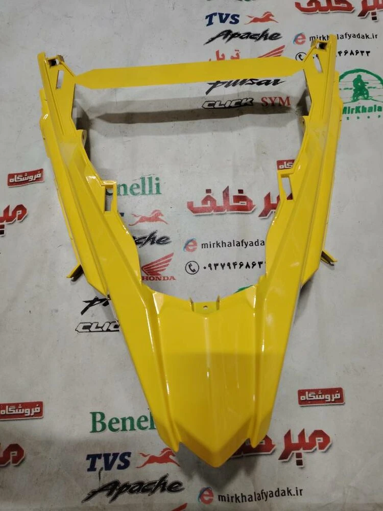 قاب (کاور فلاپ) زیر بلوری چراغ جلو موتور sym گالکسی nh اصلی زرد طلایی