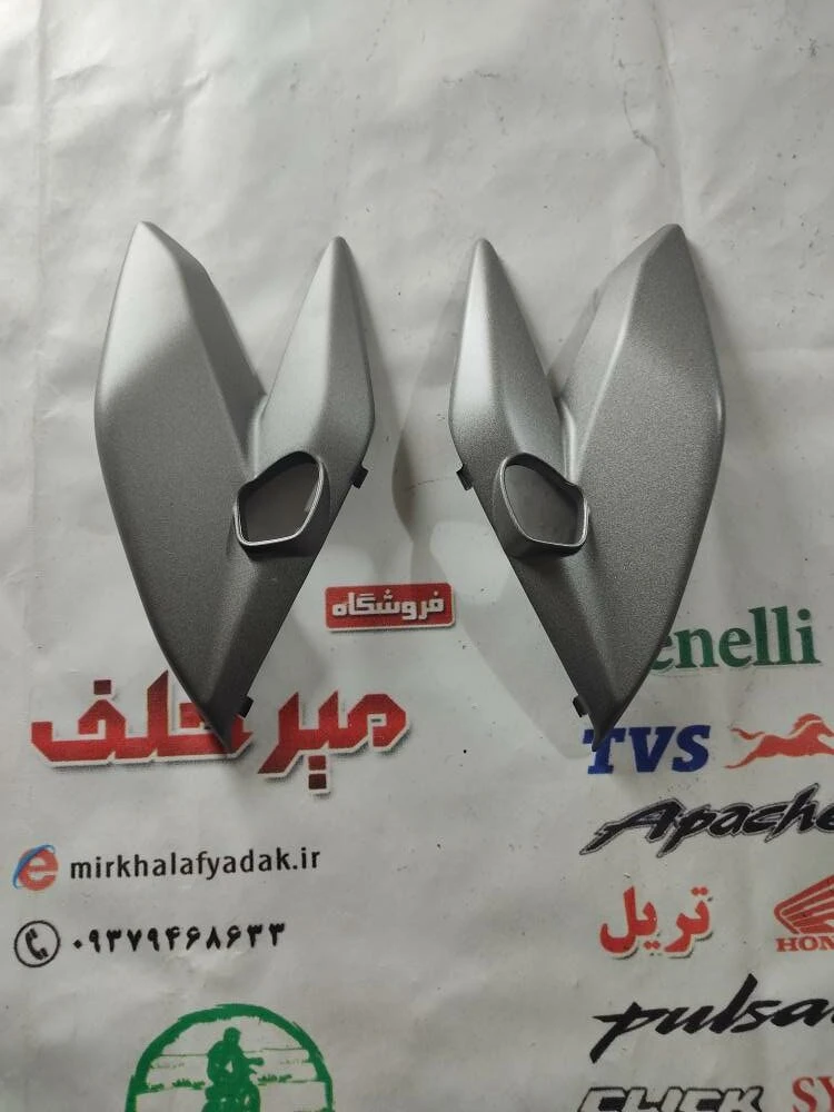 قاب (کاور فلاپ) گوشواره بغل بلوری چراغ جلو موتور اپاچی 200 طوسی مدادی اصلی (جفتی)