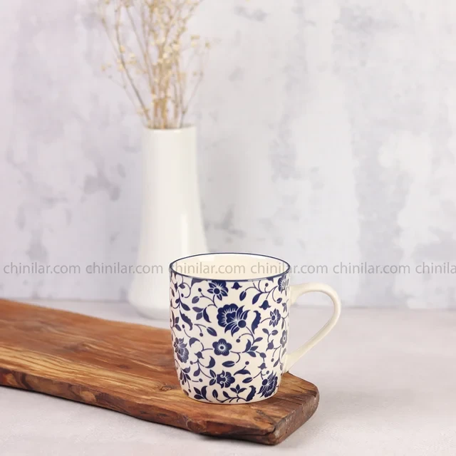 لیوان دسته دار پروتی طرح گل آبی