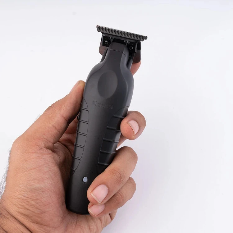 ماشین اصلاح موی صورت و بدن کیمی مدل KM- 2299 اصلی با پک کامل kemei