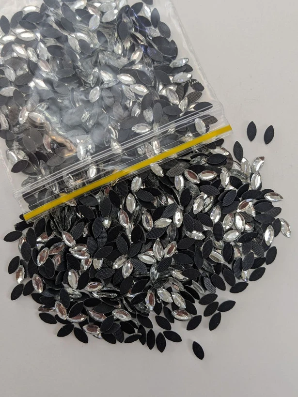 نگین حرارتی dmc چشمی 9*3 نقره ای