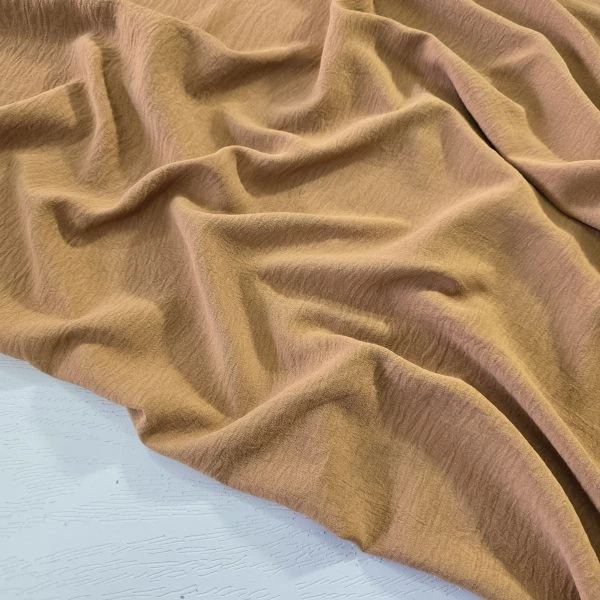 پارچه کرپ ابروبادی درجه یک عرض ۱۵۰ رنگ نسکافه ای
