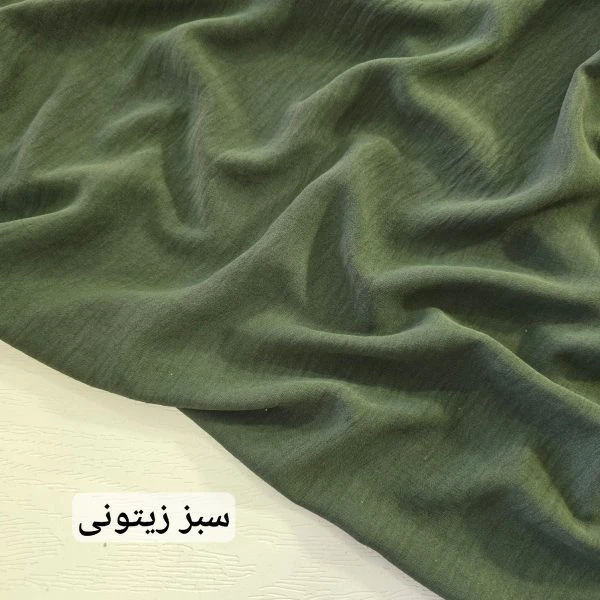 پارچه کرپ ابروبادی گرم بالا رنگ سبز زیتونی