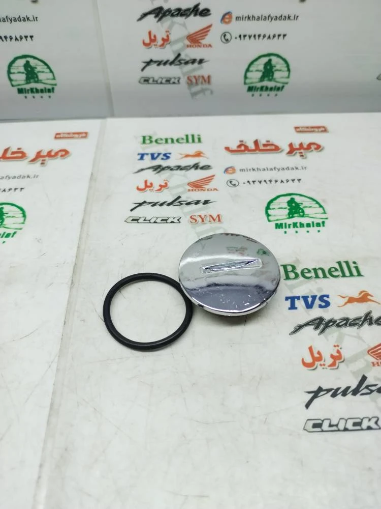 پیچ (مهره) بزرگ روی درب برق موتور هوندا و تریل نقره ای