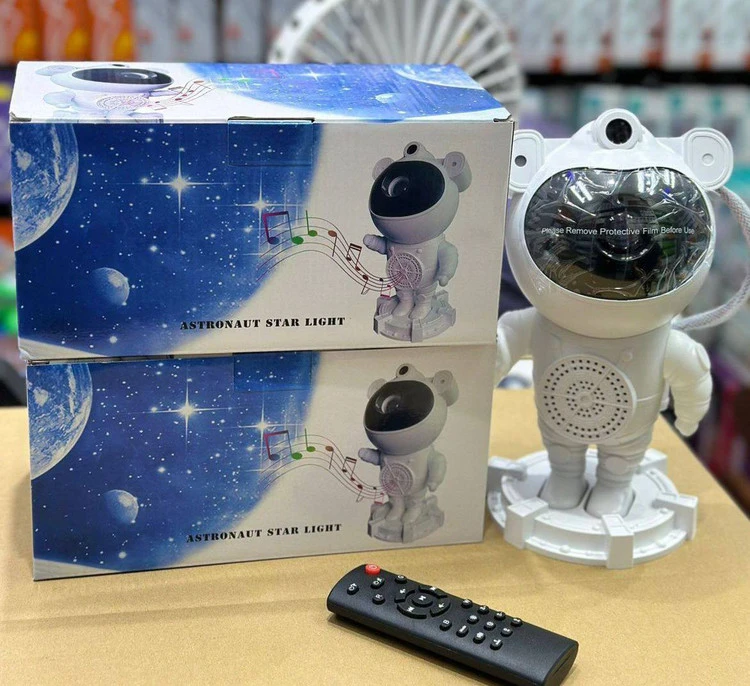 چراغ خواب پروژکتوری اسپیکردار کهکشانی مدل فضانورد ایستاده (Astronaut Star Light)