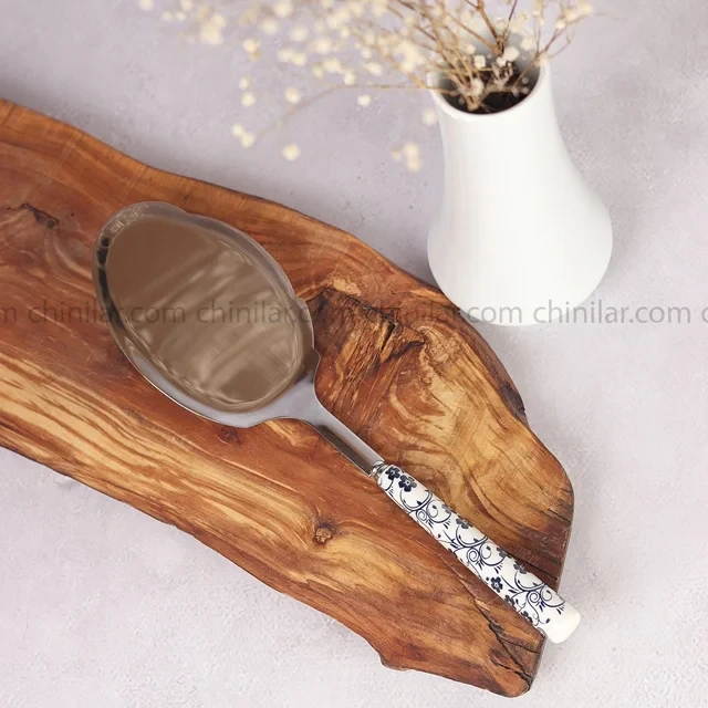 کفگیر استیل دسته گل آبی دنی هوم
