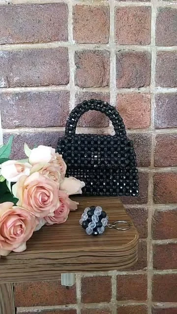 کیف دسته دار مجلسی زنانه مشکی طرح مریت