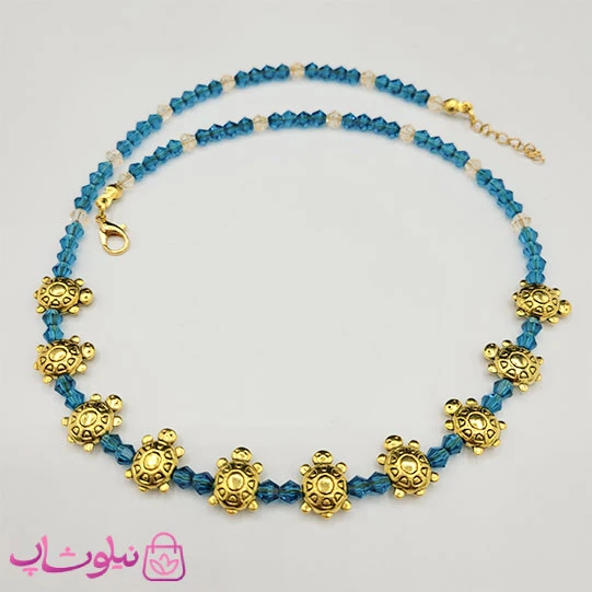 گردنبند زنانه دستساز برند N&SH مدل لاک پشتهای طلایی با کریستال سبزآبی کد 150