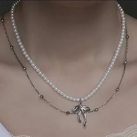 گردنبند پاپیون استیل مروارید دو لاین🎀