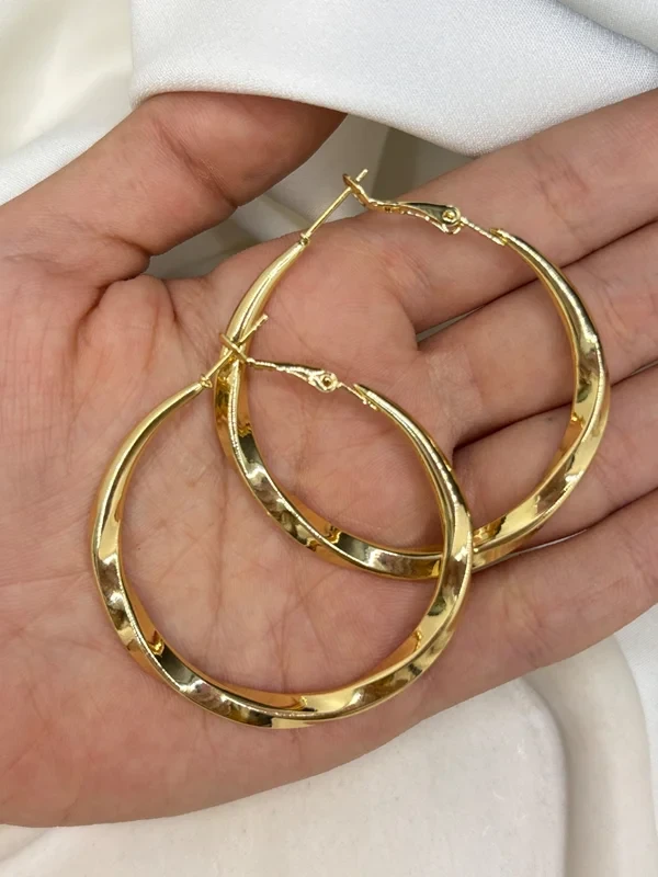 گوشواره دفرمه حلقه ای طلایی