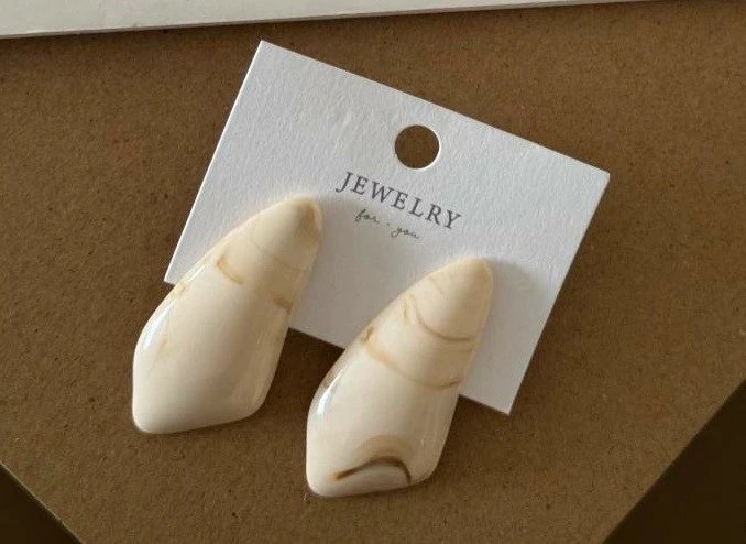 گوشواره رزینی دفرمه